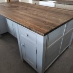 Kitchen Island With Storage And Two Recesses For Your Stools